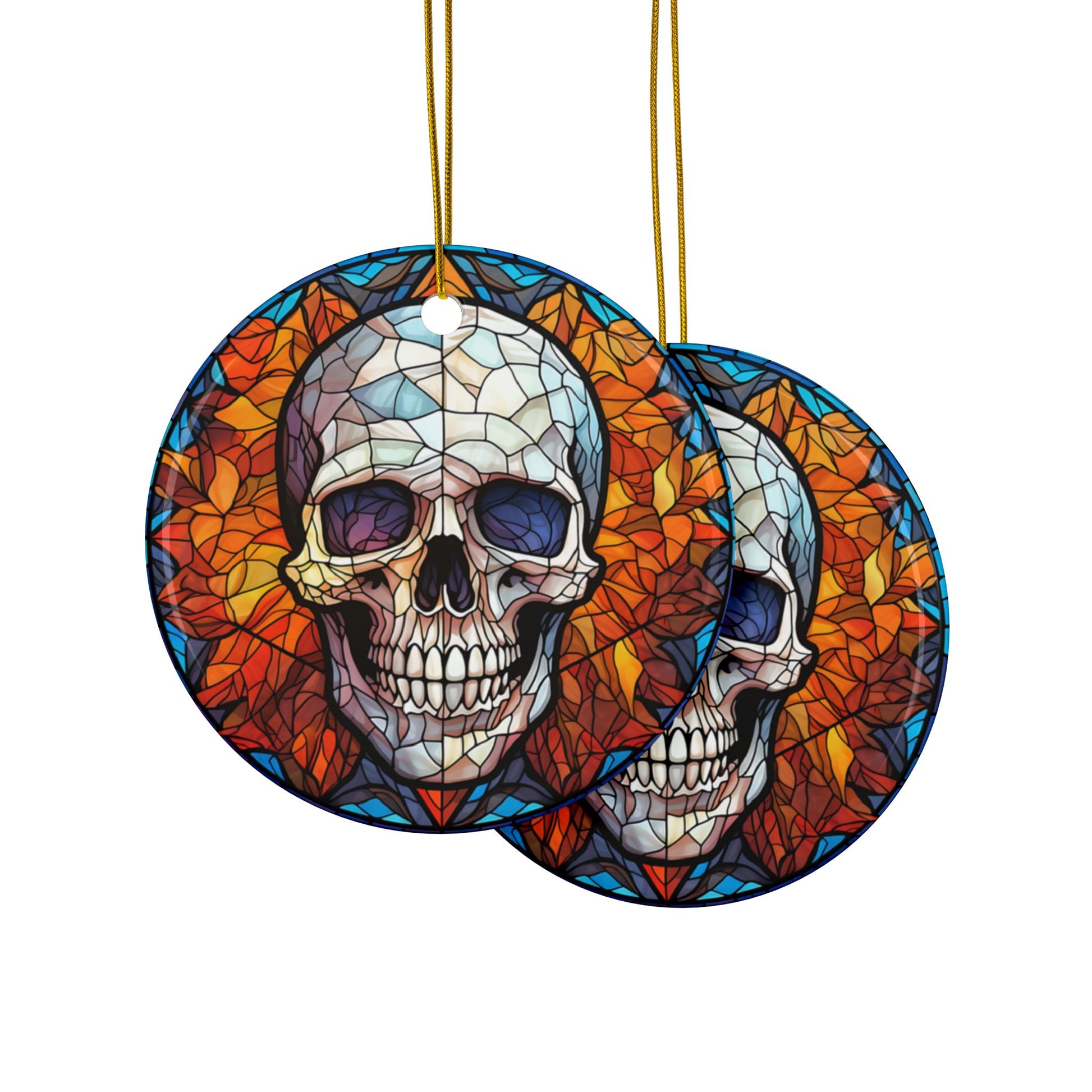 Two circular stained glass window designs featuring skulls on a white background.
